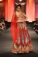 heart throbbing  Look with heavy hand work Red designer bridal  lehenga