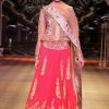 Incredible red shimmer primarily based mainly occasion costume in lehenga