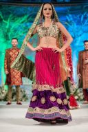 Enchanting magenta and purple color net fabric lehenga