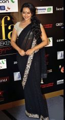 enthralling black bollywood gold embroidered borders saree
