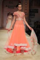 Go well with enticing orange designer  suit