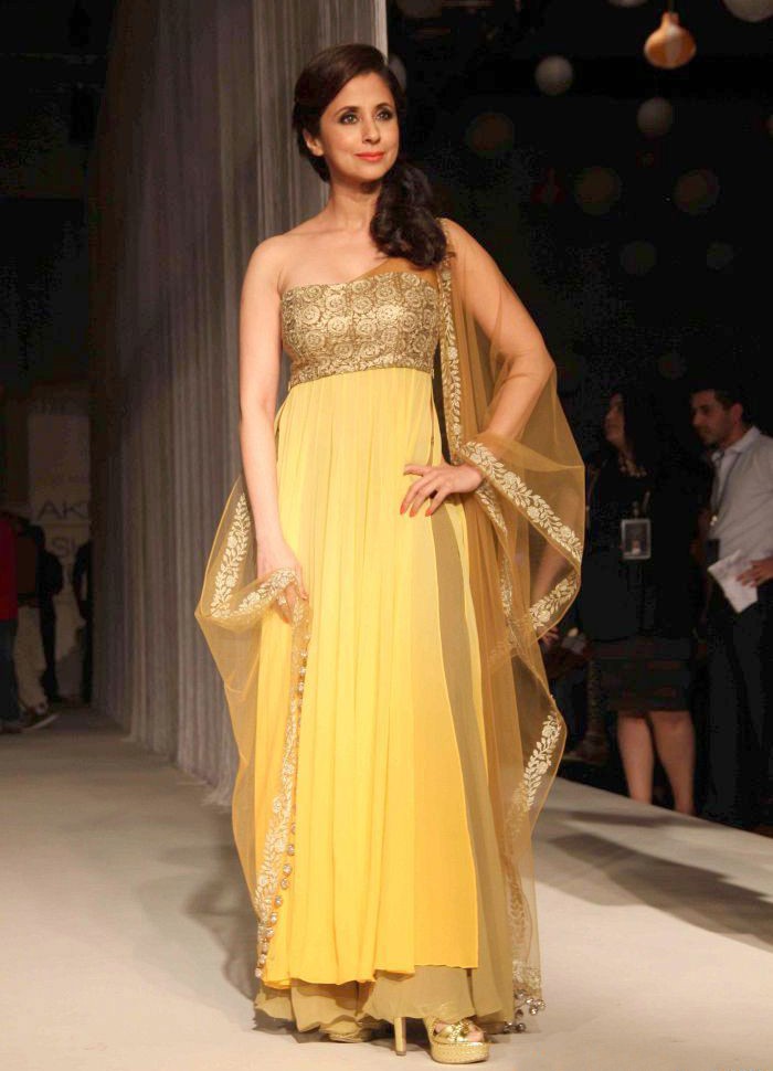 Grab this amazing  yellow color  embroidered designer suit