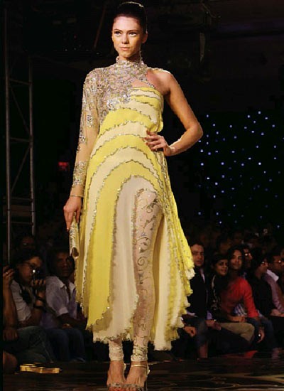 appealing yellow color awesome embroidered designer suit