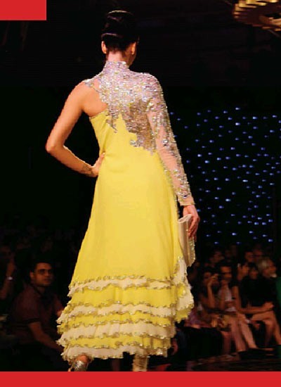 appealing yellow color awesome embroidered designer suit