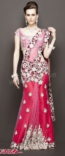 Green unstitched lehenga highlighted in pita zari embroidery