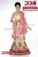 hypnotizing Tan and light Pink Wedding Lehenga having beads, cutdana work