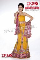 Enticing Yellow Pink Wedding Lehenga having beads, cutdana work