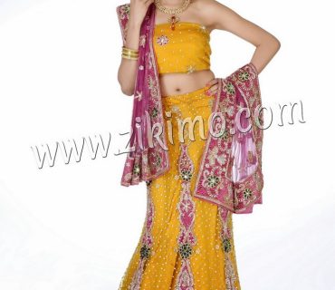 Enticing Yellow Pink Wedding Lehenga having beads, cutdana work