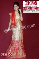 Thrilling Red Peach Indian Wedding Lehenga having beads, cutdana work