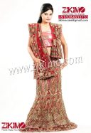 Mind Boggling Bridal Lehenga with mango nakshi and cutdana Work