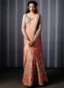 Peach Silk Mehendi Sangeet Function Wearing Lehenga Saree with Gota Patti Work at Zikimo