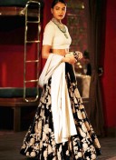 Black & Cream Wedding Sangeet Lehenga Choli with Floral Embroidery at Zikimo