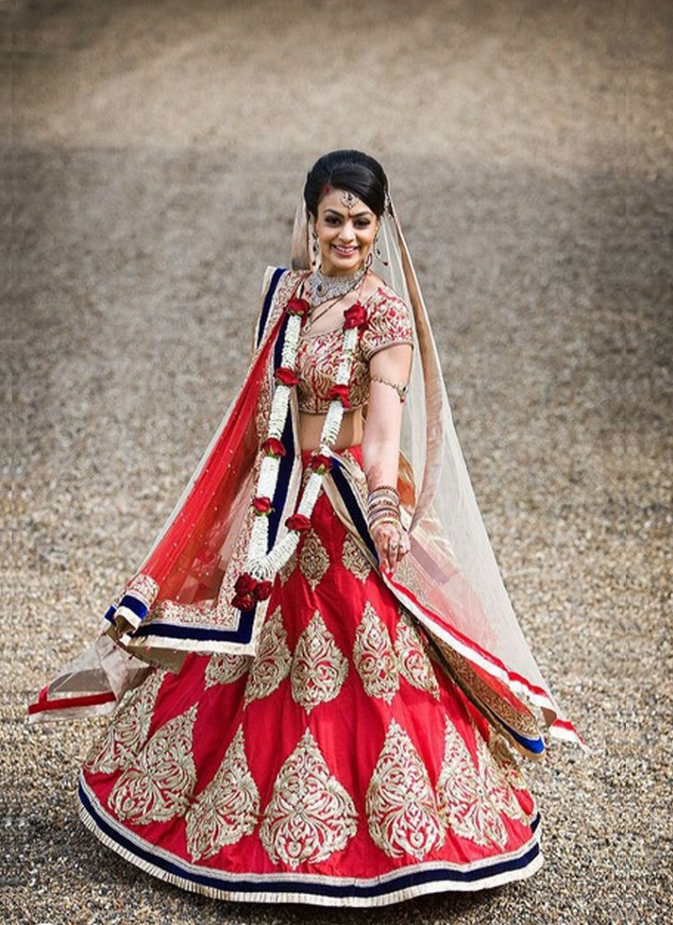 Designer Red Heavy Bridal Lehenga with Gold Embroidery at Zikimo