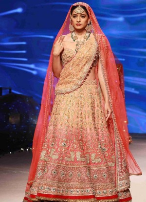 Designer Peach & Pink Heavily Embellished Indian Bridal Lehenga Choli at Zikimo