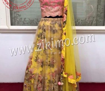 Zikimo Party wear Yellow Floral Lehnega With Pink Choli