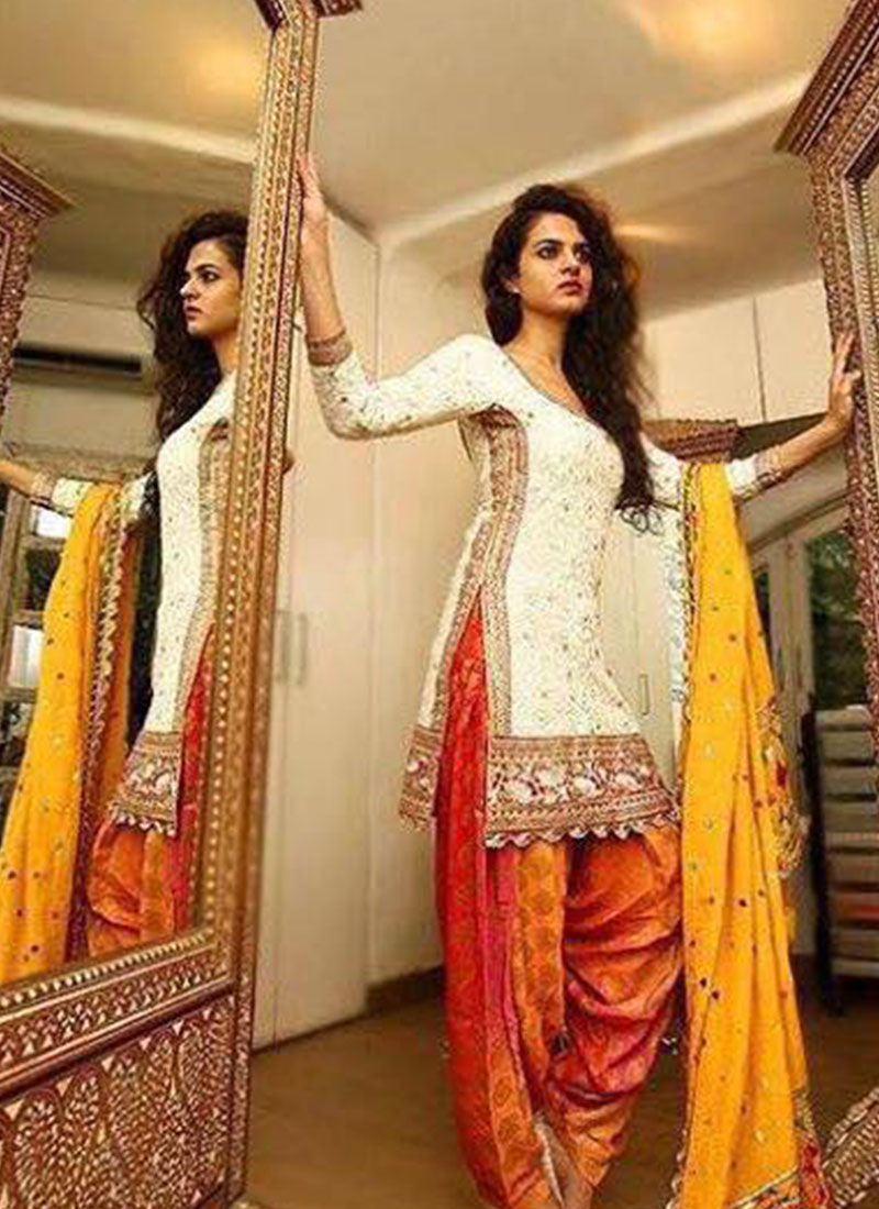 Floral White With Orange Embroidered and Lace Work Punjabi Salwar Kameez At Zikimo
