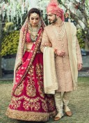 Elegant Red Bridal Lehenga Choli with Floral Zardozi Embroidery at Zikimo