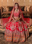 Red & Orange Gorgeous Bridal Lehenga Choli with Gota Work at Zikimo