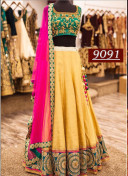 Yellow An Green Mehandi Sangeet Banglori Silk Lehenga Choli at Zikimo