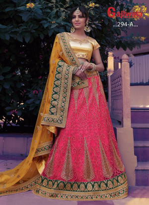Hot Pink Heavy Embroidered Indian Wedding Wear Net Lehenga choli With Yellow Dupatta at Zikimo