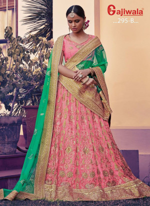 Pink Heavy Embroidered Indian Wedding Wear Net Lehenga choli With Green Dupatta at Zikimo