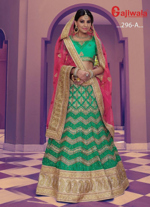 Green Heavy Embroidered Indian Wedding Wear Net Lehenga choli With HotPink Dupatta at Zikimo