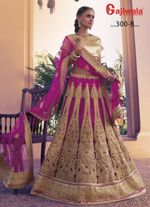 Fuscia Purple Heavy Embroidered Indian Wedding Wear Net Lehenga Choli at Zikimo