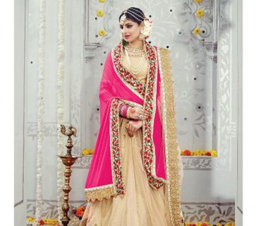 PeachPink3609 LycraNet Zari.DiamondWork WeddingParty Saree At Zikimo