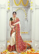 CreamGreen3616 BanarsiSilk Zari.DiamondWork WeddingParty Saree At Zikimo