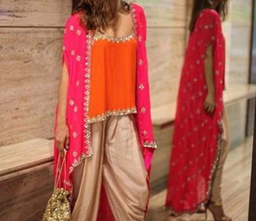OrangePink7124 Georgette Lycra Short Top With Dhoti And Pink Net Dupatta at Zikimo