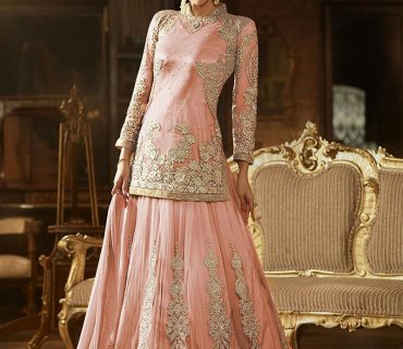 PeachPink Sybella65 Net WeddingPartyWear LehengaCholi at Zikimo